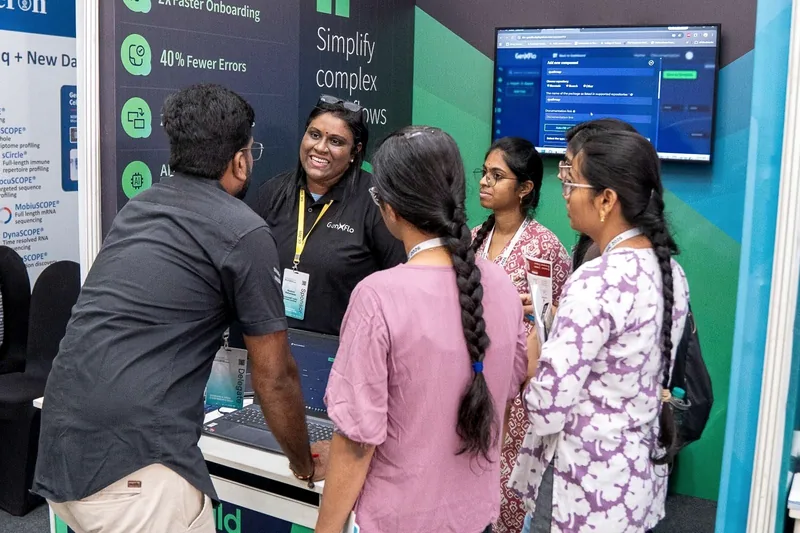 Visitors at the GenXFlo stand at the Genomics India Conference